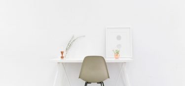Desk and Chair in a white room